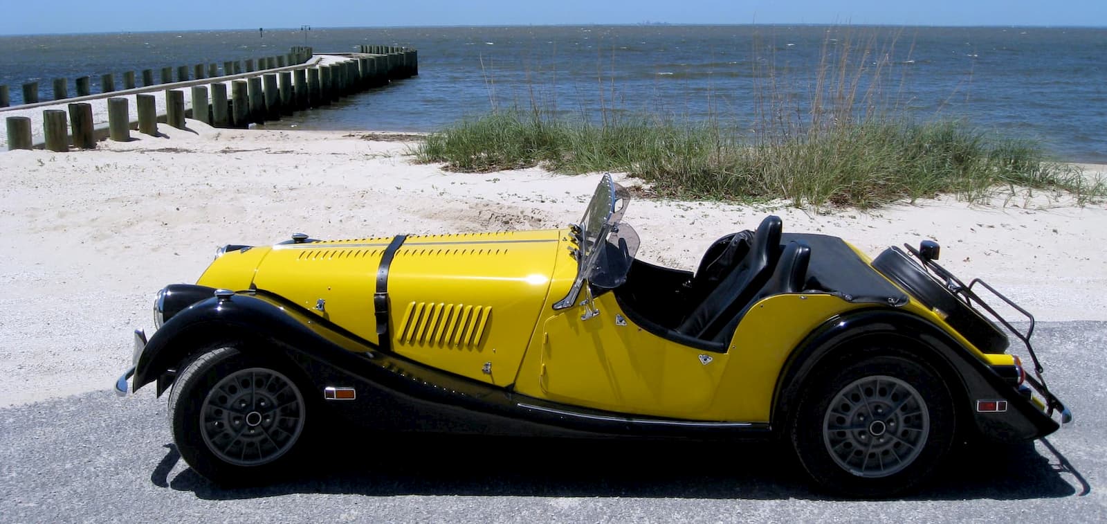 Morgan car on a beach